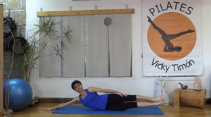 pilates elevación lateral tronco y piernas